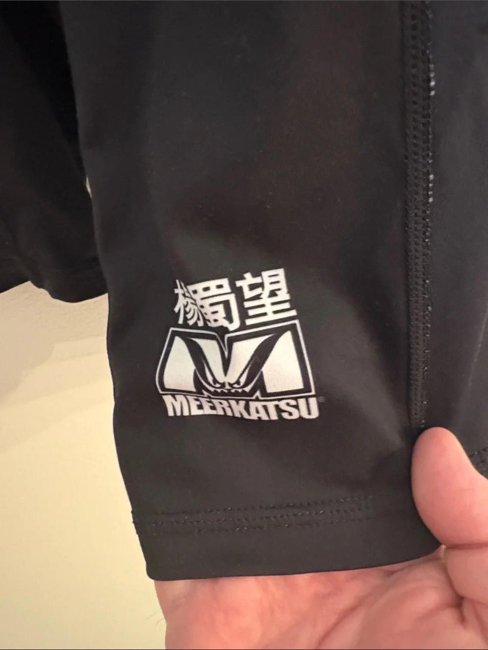 Tatami Fightware x Meerkatsu Original artwork black rash guard w/ animal graphic